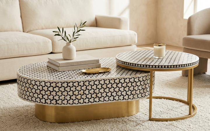 Black and white Mother of Pearl oval coffee table set with brass and powder-coated stands