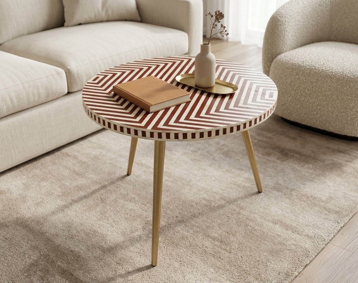 Round brown bone inlay coffee table with geometric chevron pattern