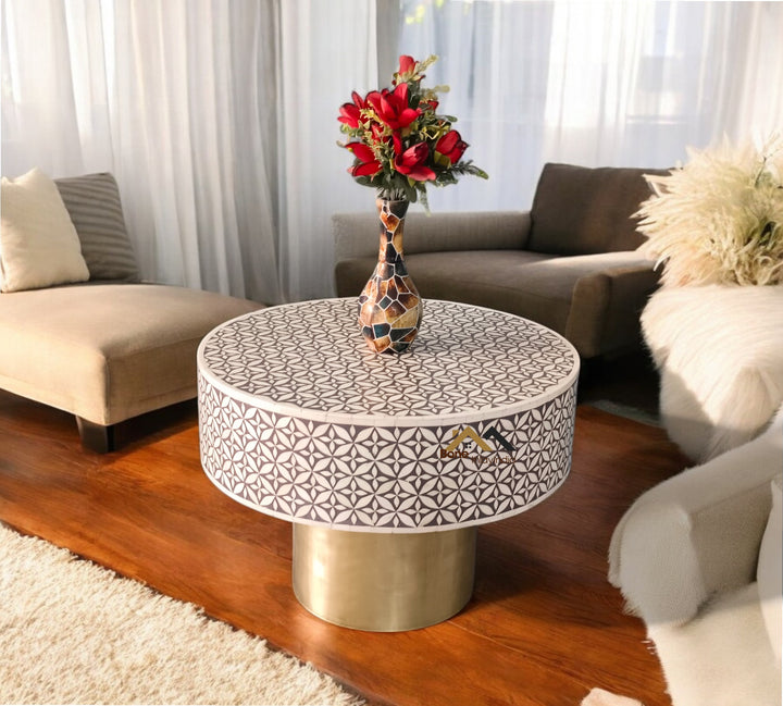 Grey bone inlay round coffee table with geometric pattern and brass base
