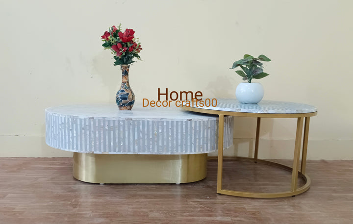 Grey and white mother of pearl inlay oval nesting coffee tables with gold powder-coated metal stands