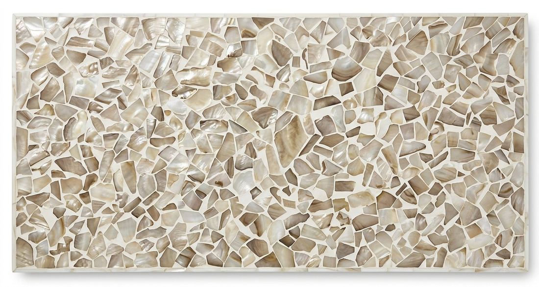 Close-up view of natural Mother of Pearl mosaic inlay on a rectangular coffee table top